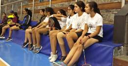 Girls await their turn to play for the tournament
